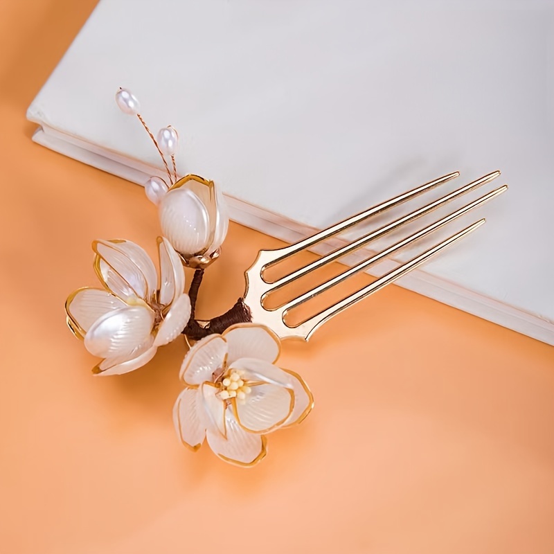 中国風シェルマグノリアフラワーヘアコーム、パールタッセル付き - Supply Florist のレビューと価格